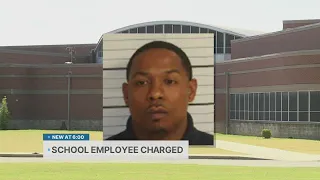 School employee accused of stabbing driver with pen