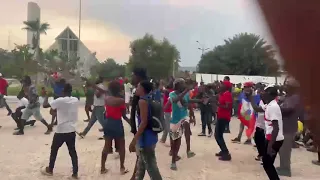 Public reaction in Gonaïves to the national team's 2nd goal against Morocco.
