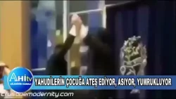 YAHUDİLERİN ÇOCUĞA ATEŞ EDİYOR, ASIYOR, YUMRUKLUYOR