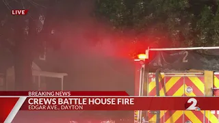 Crews battle house fire on Edgar Avenue in Dayton