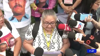 Searching mothers protest and report threats from government workers