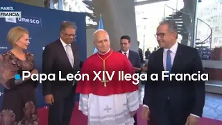 Pope Leo XIV begins a pastoral trip to France and was received by President Macron in Paris.