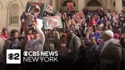 Migrants rally at City Hall for better quality of life