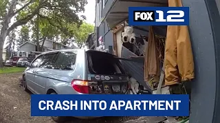 Minivan crashes into NW Portland apartment, narrowly missing girl inside