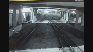 Video shows car fly off roadway, crash into train car during police pursuit in Bedford Park