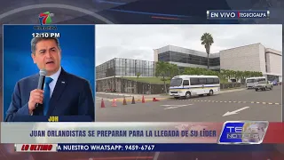 Juan Orlandistas prepare for their leader's arrival in the country