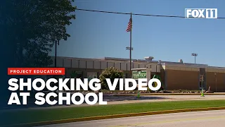 Caught on camera: Middle schooler yanks down another student by the hair