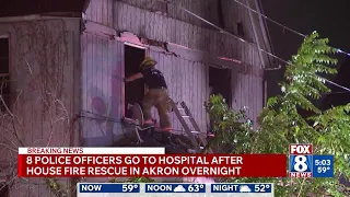 8 police officers in the hospital after Akron house fire