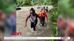 Autoridades rescatan 23 personas atrapadas por las crecientes aguas del Río Tireo, Monseñor Nouel Autoridades rescatan 23 personas atrapadas por las crecientes aguas del Río Tireo, Monseñor Nouel
