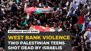 Two Palestinian teens killed as settlers, Israeli forces raid West Bank village