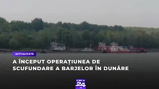 A început operațiunea de scufundare a barjelor în Dunăre pentru devierea cursului
