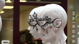 Artist creates masks with 3D pen