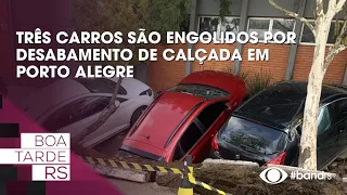 Three cars swallowed by sidewalk collapse in Porto Alegre