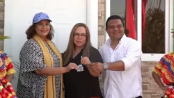 Families receive keys to their homes at the Las Madres residential development