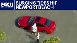 High tide floods streets of Newport Beach
