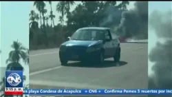 Incendio de vehículo compacto moviliza a autoridades en la carretera Acapulco Zihuatanejo