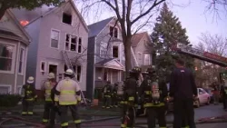 Woman rescued from Chicago house fire; 2 families displaced