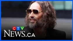 Russell Brand arrives at court for rape and sexual assault trial