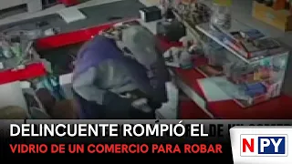 Criminal breaks store window to commit robbery