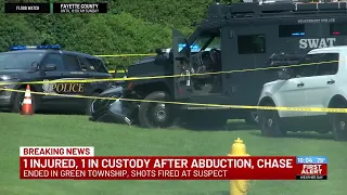1 injured, 1 in custody after abduction, chase