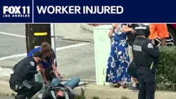 Worker injured after semi hits utility vehicle Worker injured after semi hits utility vehicle