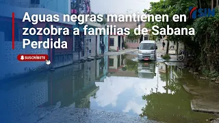Sewage overflow between homes in Sabana Perdida