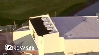 Clean-up crews spend the morning clearing monsoon damage at Tempe school