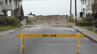 Milford's Anchor beach residents dealing with high water and sand on street