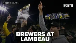 Brewers surprise Lambeau Field crowd with Commissioner's Trophy, Lambeau Leaps, sausage race