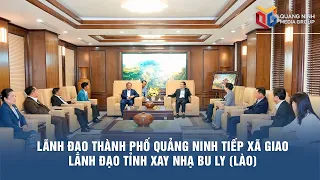 Quang Ninh city leaders host a courtesy meeting with leaders of Xaignabouli province (Laos)