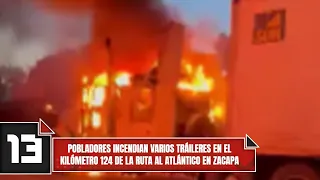 Residents set several tractor-trailers on fire at kilometer 124 of the route to the Atlantic in Z...