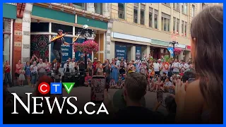 Fire throwers and acrobats draw crowds at Busker Festival