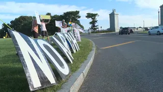 Protesters gather at proposed site of the Triumphal Arch in D.C.