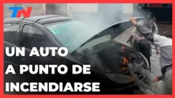 SUSTO EN PLENO TEMPORAL: Un auto comenzó a incendiarse y un vecino lo apagó bajo la lluvia