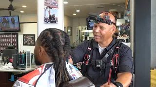 Here's why an 'old school' San Jose barber is now teaching robots to cut hair with AI