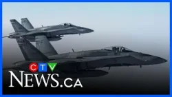 Двое мужчин арестованы после того, как истребители сопровождали два рейса, направлявшихся в Монре...