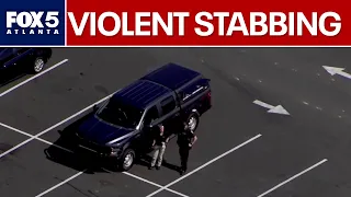 Mother runs inside restaurant after parking lot stabbing | FOX 5 News