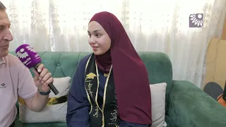 Student Ni'ma Yousef Abu Riash, top of her class in Qalqilya with a 99.3 GPA, Literary Stream - Q...