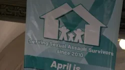 CODA, local leaders drop banner ahead of Sexual Assault Awareness Month