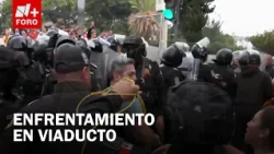 Riña entre trabajadores del IMSS y policías por bloqueo en Viaducto, CDMX