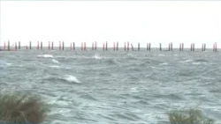 Isaias weakens, but flooding threats and widespread power outages persist