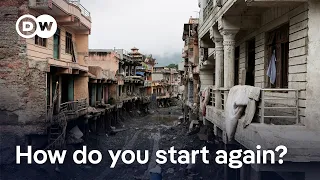 Nepal floods: Survivors return to homes destroyed in minutes | DW News