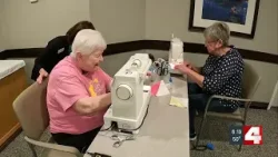 Seniors at Cedarhurst of Tesson Heights quilt for foster children, veterans