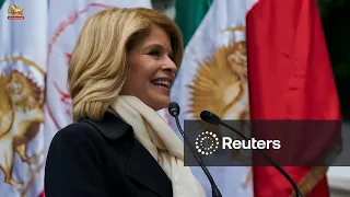 Reuters, Carla Sands speaks at a rally of Maryam Rajavi supporters in front of the United Nations...