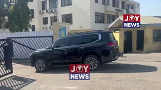 EOCO officials return from the residence of Nana Agyei Baffour after conducting their search.
