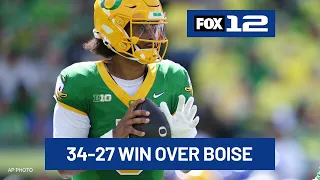 Moore throws for 3 TDs and No. 2 Oregon overcomes a slow start to beat Boise State 34-27