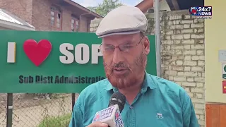 ADC Sopore S A Raina speaking about the ongoing developmental projects at Sopore