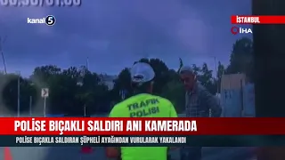 MOMENT SUSPECT ATTACKS POLICE WITH KNIFE CAUGHT ON CAMERA