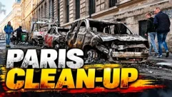 Burnt out cars and shattered glass litter Paris streets