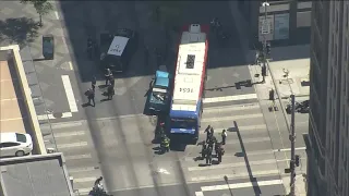 Commerce City police pursuit ends in crash with RTD bus in downtown Denver